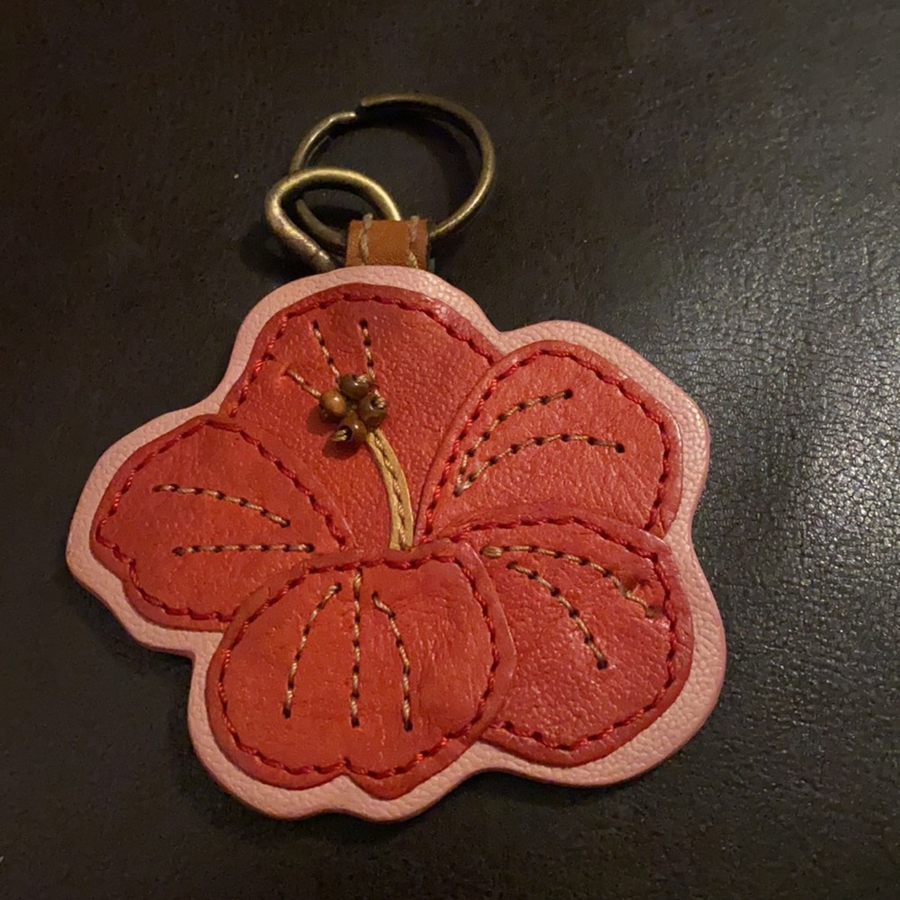 Fossil bag charm in good condition